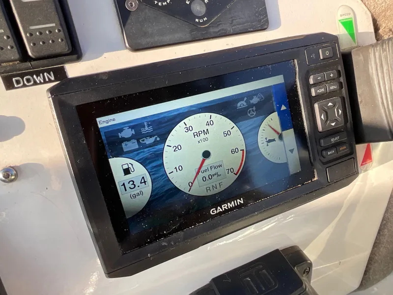 Slide: The Image of Garmin display on 2013 Sealegs 7.7m Cabin showing engine RPM and fuel flow. - 16