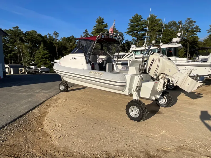 Slide: The Image of 2013 Sealegs 7.7m Cabin amphibious boat on land with wheels extended. - 3