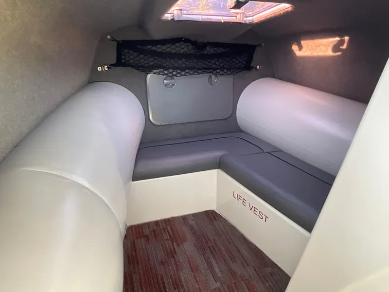 Slide: The Image of Interior of 2013 Sealegs 7.7m Cabin with seating and life vest storage. - 9
