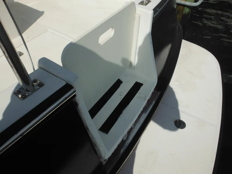 Slide: The Image of Nordic Tug 32 (2005) boat deck detail with white step and handle. - 13