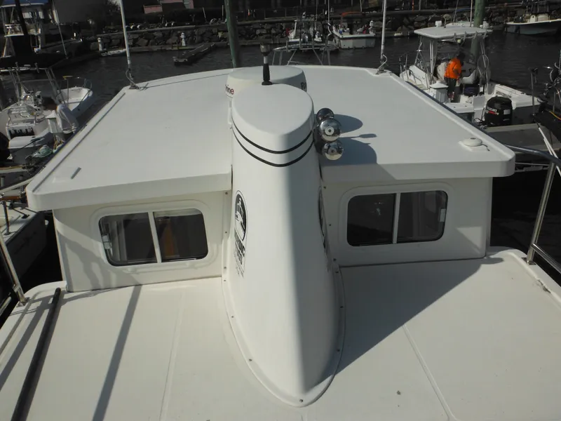 Slide: The Image of 2005 Nordic Tug 32 boat roof view at marina. - 20