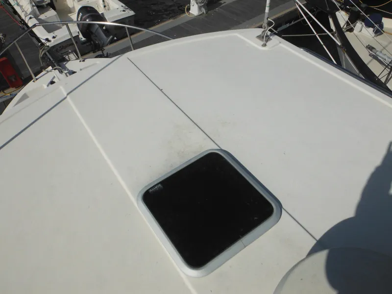 Slide: The Image of Nordic Tug 32 (2005) deck view with hatch, docked at marina. - 21