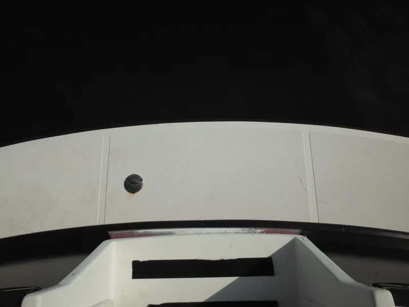 Slide: The Image of Nordic Tug 32 (2005) boat deck with a circular fixture, viewed from above. - 9