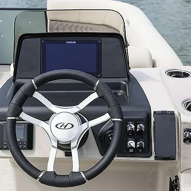 Slide: The Image of Steering console of 2023 Harris 230 Sunliner boat with modern controls and display. - 9