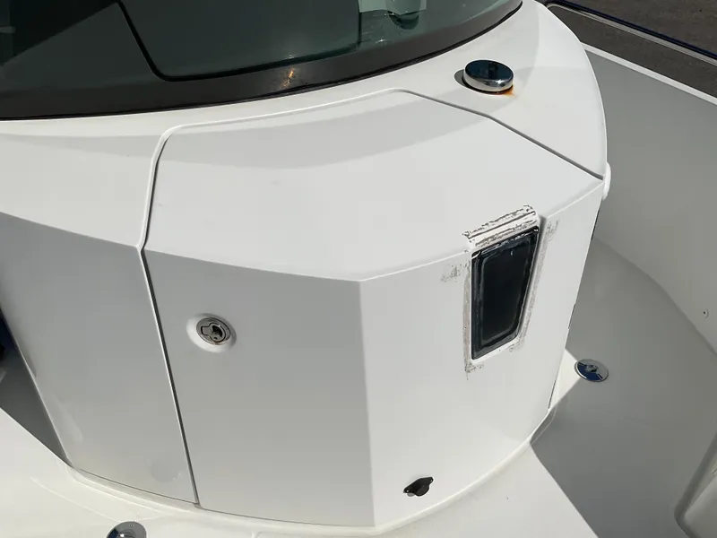 Slide: The Image of Axopar 28 boat detail, 2020 model, featuring sleek white exterior design. - 16