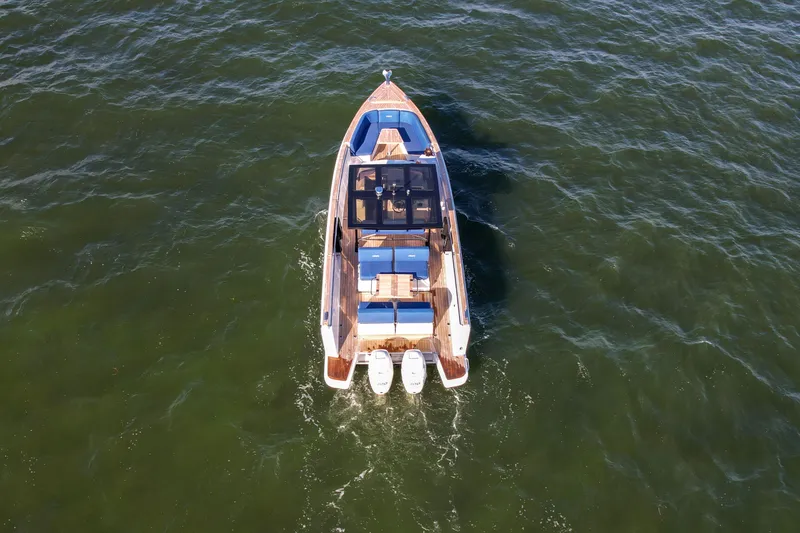 Slide: The Image of Aerial view of 2019 Fjord 38 Xpress boat cruising on open water. - 5