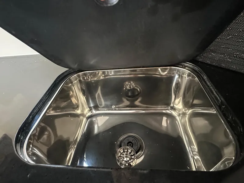 Slide: The Image of Stainless steel sink in 2025 Monterey Elite 30 OB boat. - 22