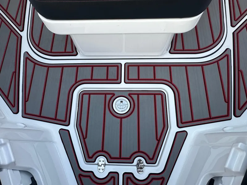 Slide: The Image of 2025 Monterey Elite 30 OB boat deck with red and gray pattern. - 33