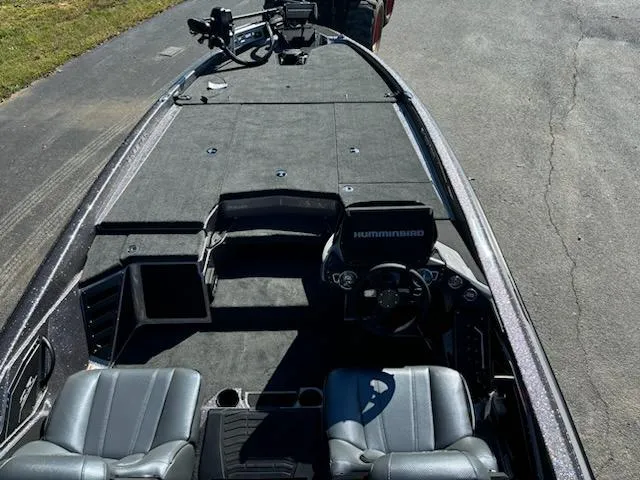 Slide: The Image of 2025 Skeeter ZXR 21 boat interior with dual seats and advanced navigation system. - 5