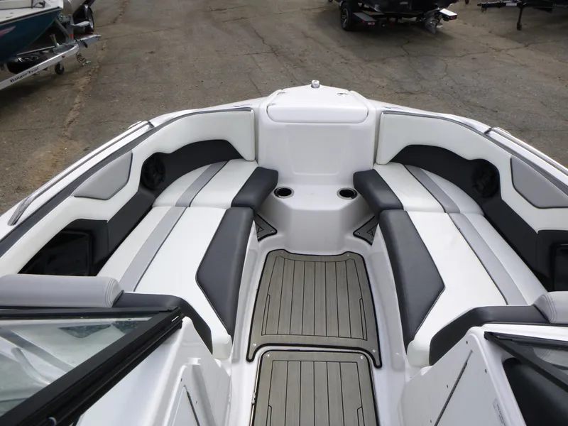 Slide: The Image of 2021 Yamaha Boats 212S interior with sleek seating and modern design. - 19