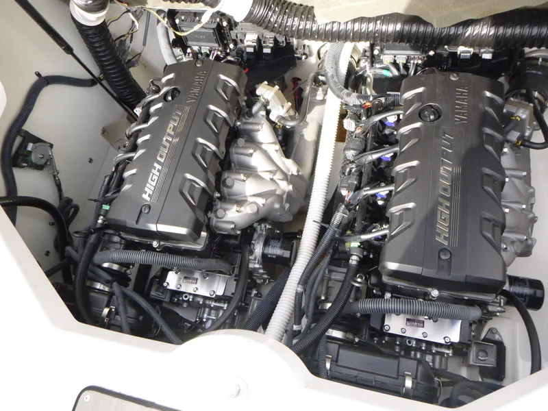 Slide: The Image of 2021 Yamaha Boats 212S engine compartment with dual high-output engines. - 22