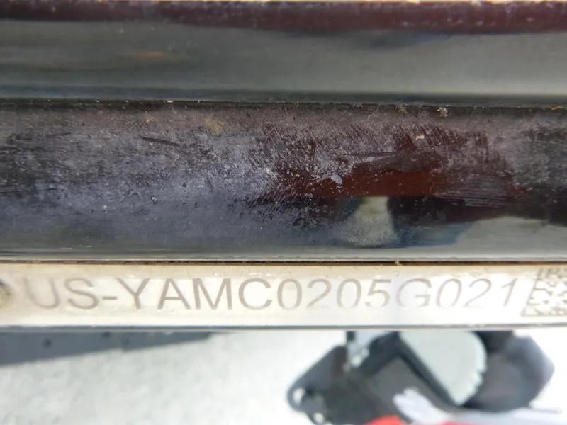 Slide: The Image of Close-up of 2021 Yamaha Boats 212S hull identification number. - 27