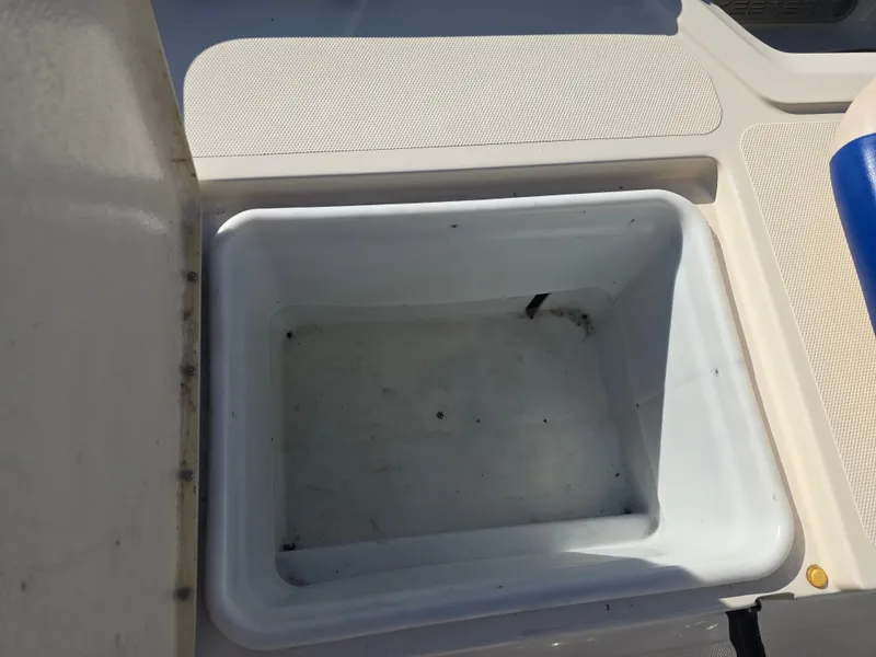 Slide: The Image of 2009 Skeeter ZX 20 Bay boat storage compartment, open and empty. - 19