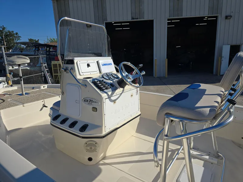 Slide: The Image of 2009 Skeeter ZX 20 Bay boat interior with steering console and seating. - 8