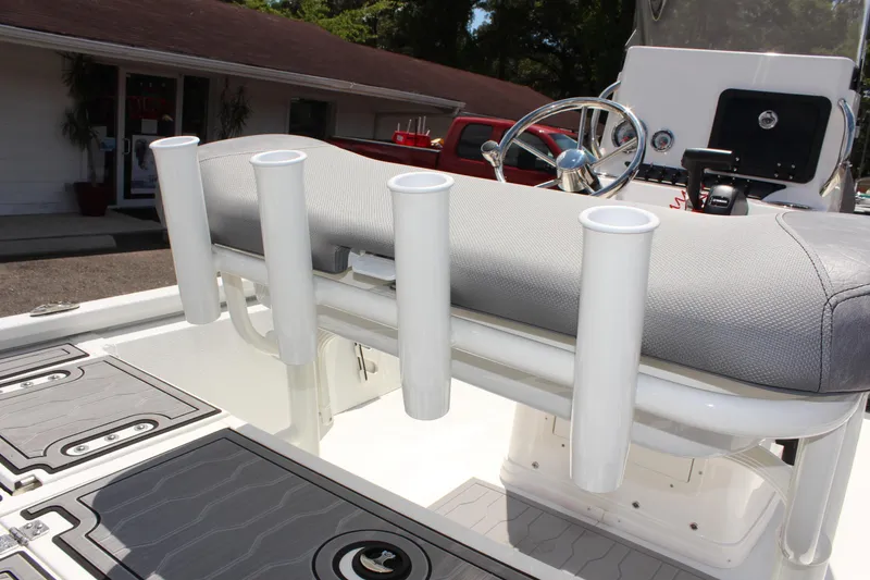 Slide: The Image of 2024 Avid 19 FSX boat interior with rod holders and seating. - 16