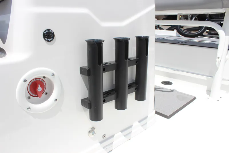 Slide: The Image of 2024 Avid 19 FSX boat with rod holders and fuel cap detail. - 19