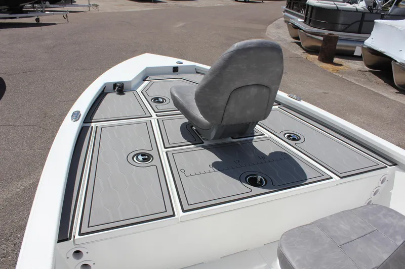 Slide: The Image of 2024 Avid 19 FSX boat deck with seating and storage compartments. - 20