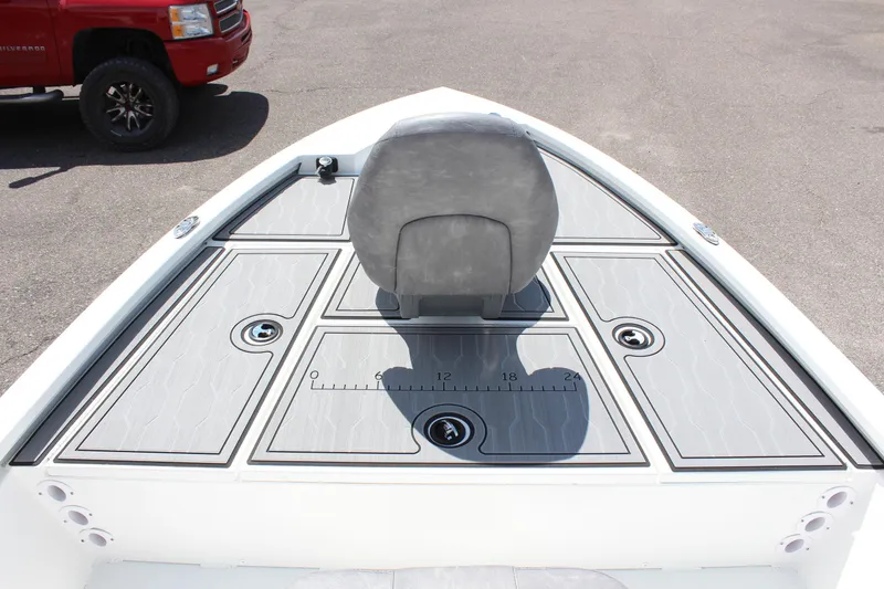 Slide: The Image of 2024 Avid 19 FSX boat deck with seating and storage compartments. - 21