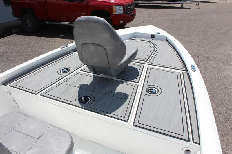 Slide: The Image of 2024 Avid 19 FSX boat deck with seating and storage compartments. - 22