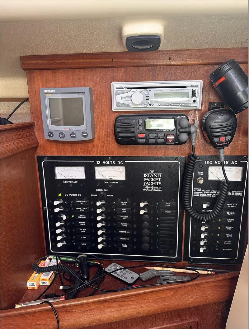 Slide: The Image of Control panel of a 2001 Island Packet 320 sailboat with navigation and communication equipment. - 17