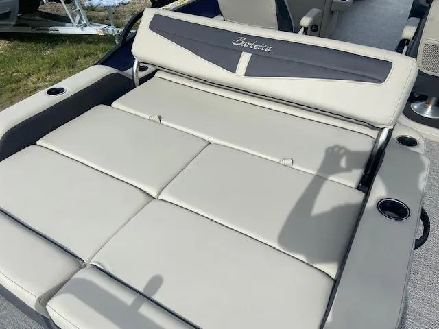 Slide: The Image of 2023 Barletta Cabrio 24 UC boat seating with cup holders and luxurious upholstery. - 20