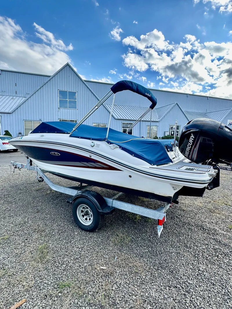 Slide: The Image of 2017 Sea Ray SPX 190 OB boat on trailer, parked outdoors. - 4