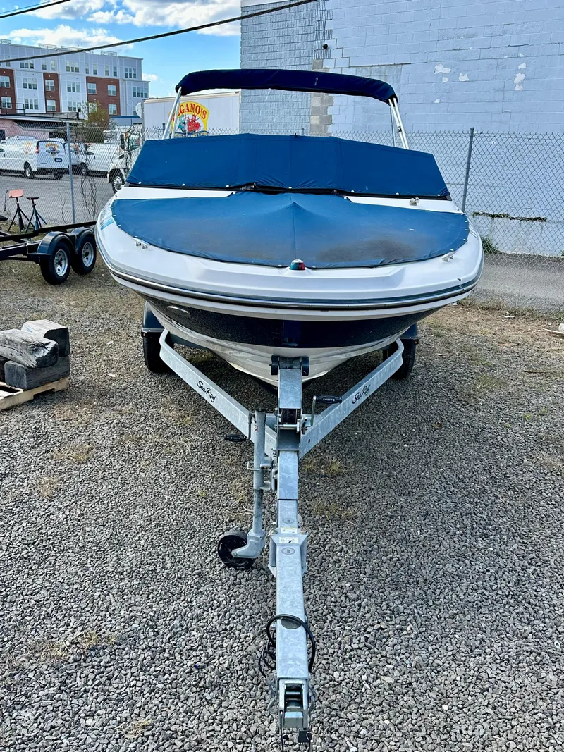 Slide: The Image of 2017 Sea Ray SPX 190 OB boat on trailer, parked outdoors. - 5