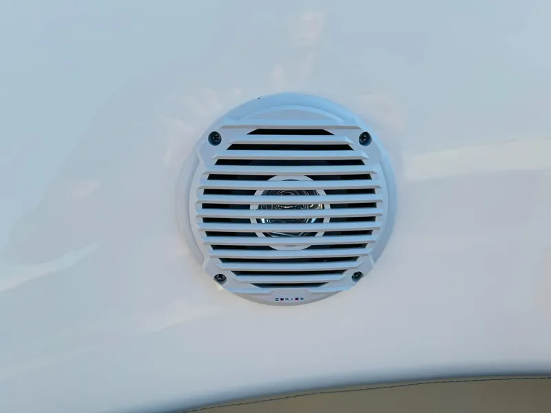 Slide: The Image of White speaker grille on 2025 Bayliner VR6 Bowrider OB boat. - 30