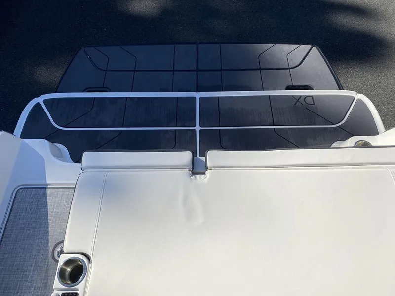 Slide: The Image of 2023 Bayliner DX2050 boat deck with sleek design and modern features. - 19