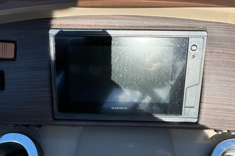 Slide: The Image of Garmin display on 2022 Bennington Cruiser 230 dashboard. - 18