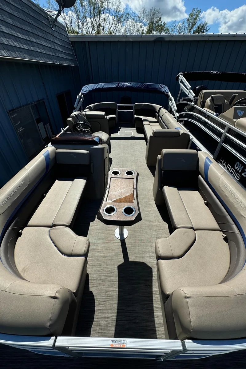 Slide: The Image of 2022 Bennington Cruiser 230 with spacious seating and modern design. - 8