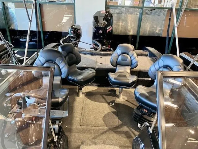 Slide: The Image of 2024 Nitro ZV19 Pro boat interior with four black cushioned seats and modern design. - 4