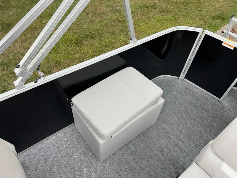 Slide: The Image of 2025 Godfrey Xperience 2086 FX boat interior with gray seating and carpet. - 13