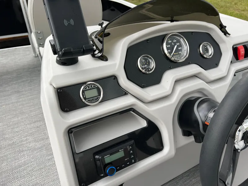 Slide: The Image of Dashboard of 2025 Godfrey Xperience 2086 FX boat with modern controls and gauges. - 20