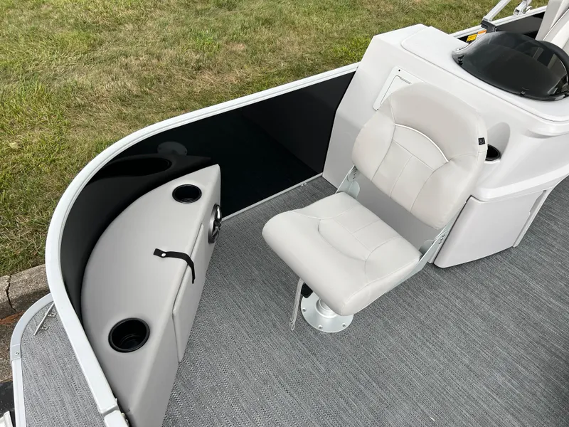 Slide: The Image of Godfrey Xperience 2086 FX 2025 boat interior with seating and cup holders. - 8