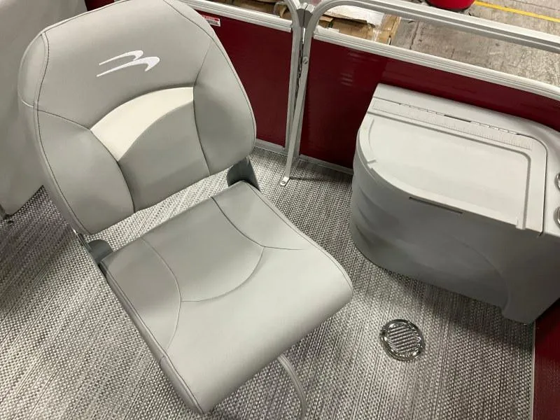 Slide: The Image of 2023 Bennington 20SVF boat interior with gray seating and red accents. - 15