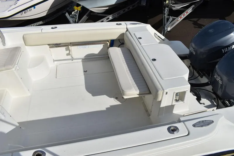 Slide: The Image of 2003 Hydra-Sports 2800 WA Vector boat deck with seating and dual Yamaha engines. - 11