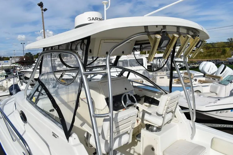 Slide: The Image of 2003 Hydra-Sports 2800 WA Vector boat with Garmin equipment, docked in a marina. - 13