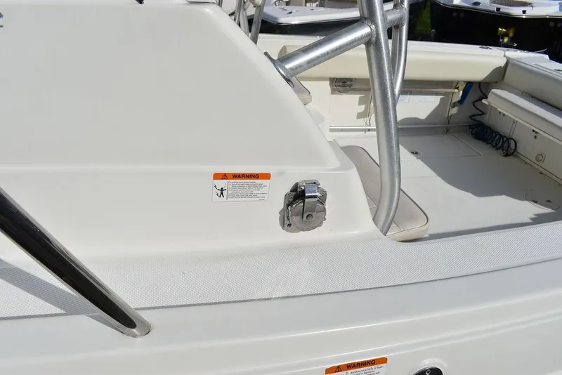 Slide: The Image of 2003 Hydra-Sports 2800 WA Vector boat deck with safety warning labels. - 20