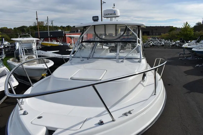 Slide: The Image of 2003 Hydra-Sports 2800 WA Vector boat with Garmin equipment, docked in a marina. - 22
