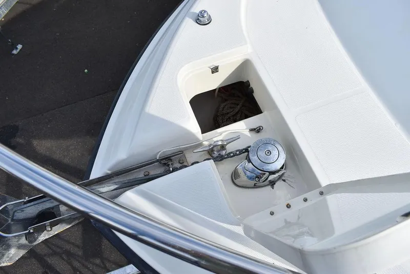 Slide: The Image of 2003 Hydra-Sports 2800 WA Vector boat deck with anchor storage and winch. - 23