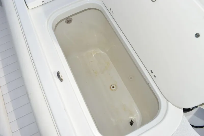 Slide: The Image of Open storage compartment on 2003 Hydra-Sports 2800 WA Vector boat. - 28