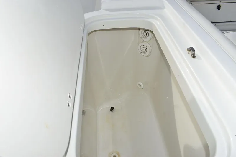 Slide: The Image of Open storage compartment on 2003 Hydra-Sports 2800 WA Vector boat. - 29