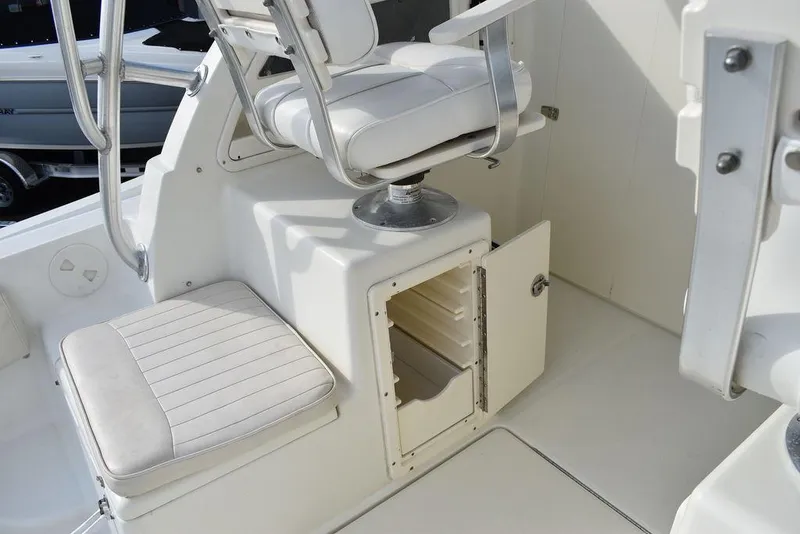 Slide: The Image of 2003 Hydra-Sports 2800 WA Vector boat interior with seating and storage compartment. - 43