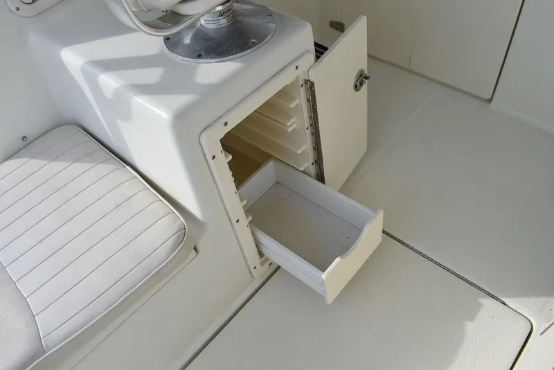 Slide: The Image of Open storage compartment on 2003 Hydra-Sports 2800 WA Vector boat interior. - 44