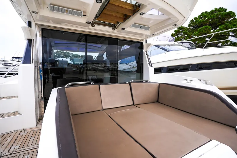 Slide: The Image of Luxurious 2017 Galeon 43 SKY yacht with spacious outdoor seating area. - 20