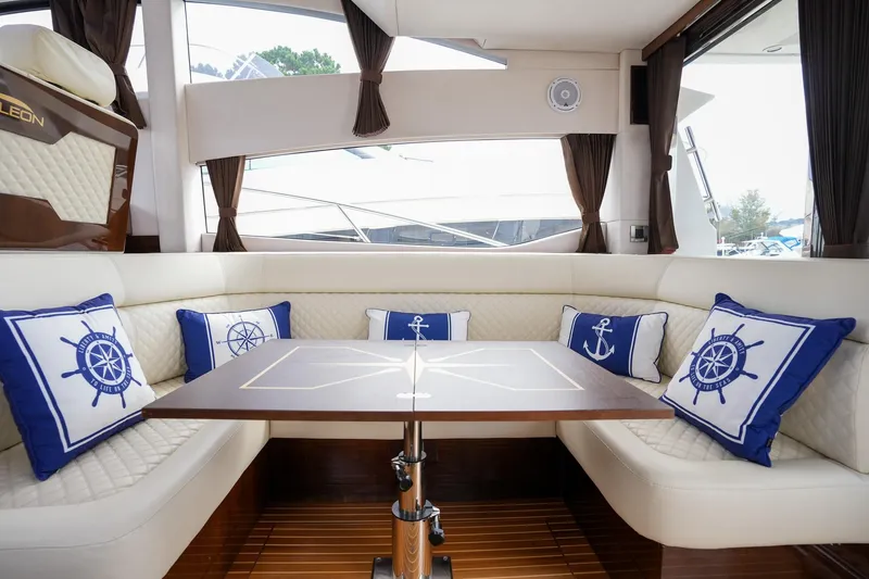 Slide: The Image of Luxurious interior of 2017 Galeon 43 SKY yacht with nautical-themed cushions. - 24