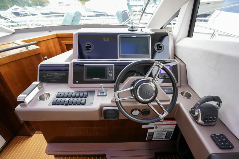 Slide: The Image of Helm of 2017 Galeon 43 SKY yacht with modern navigation equipment. - 29