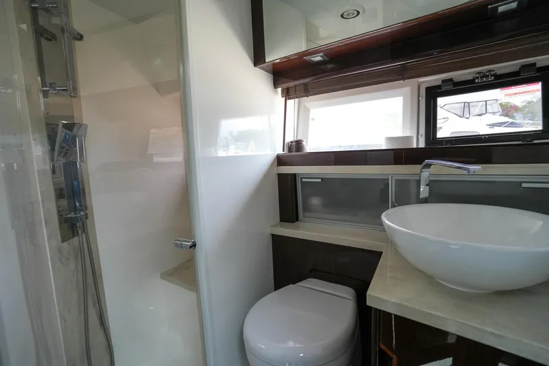 Slide: The Image of Modern bathroom in 2017 Galeon 43 SKY yacht with shower, sink, and toilet. - 32