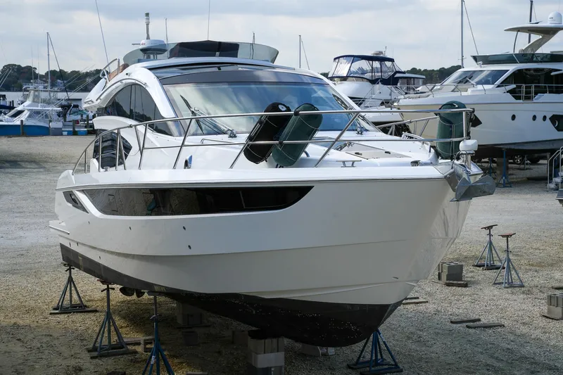 Slide: The Image of 2017 Galeon 43 SKY yacht on stands at a marina. - 5